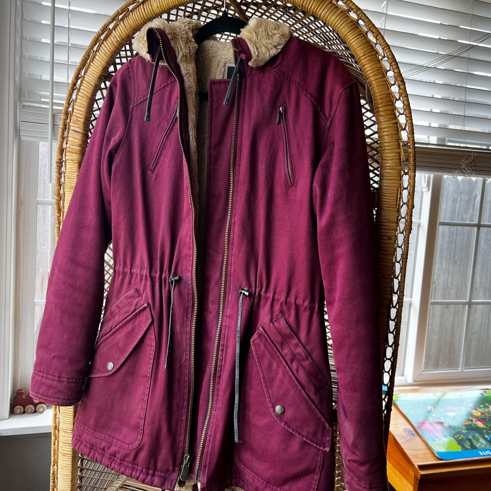 Red Ski Jacket with Water-Resistant Fabric and Adjustable Waist